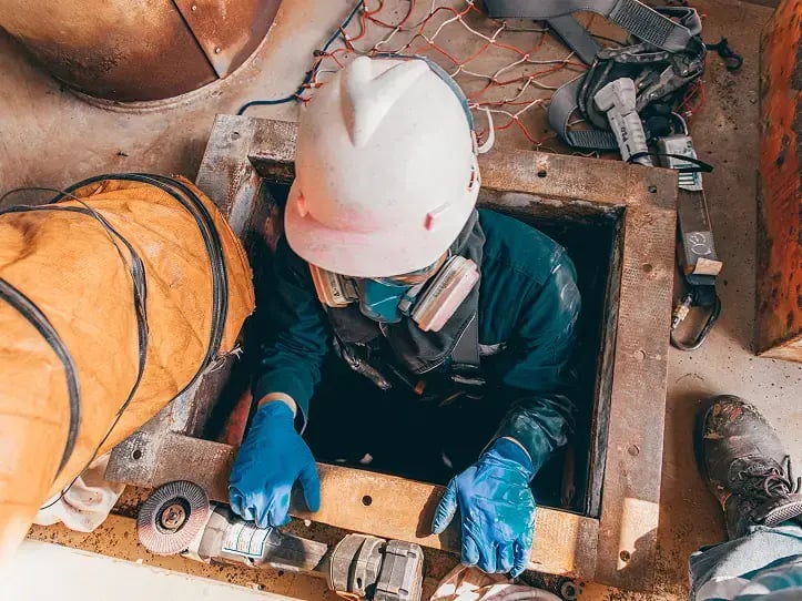 A hardhat-clad worker